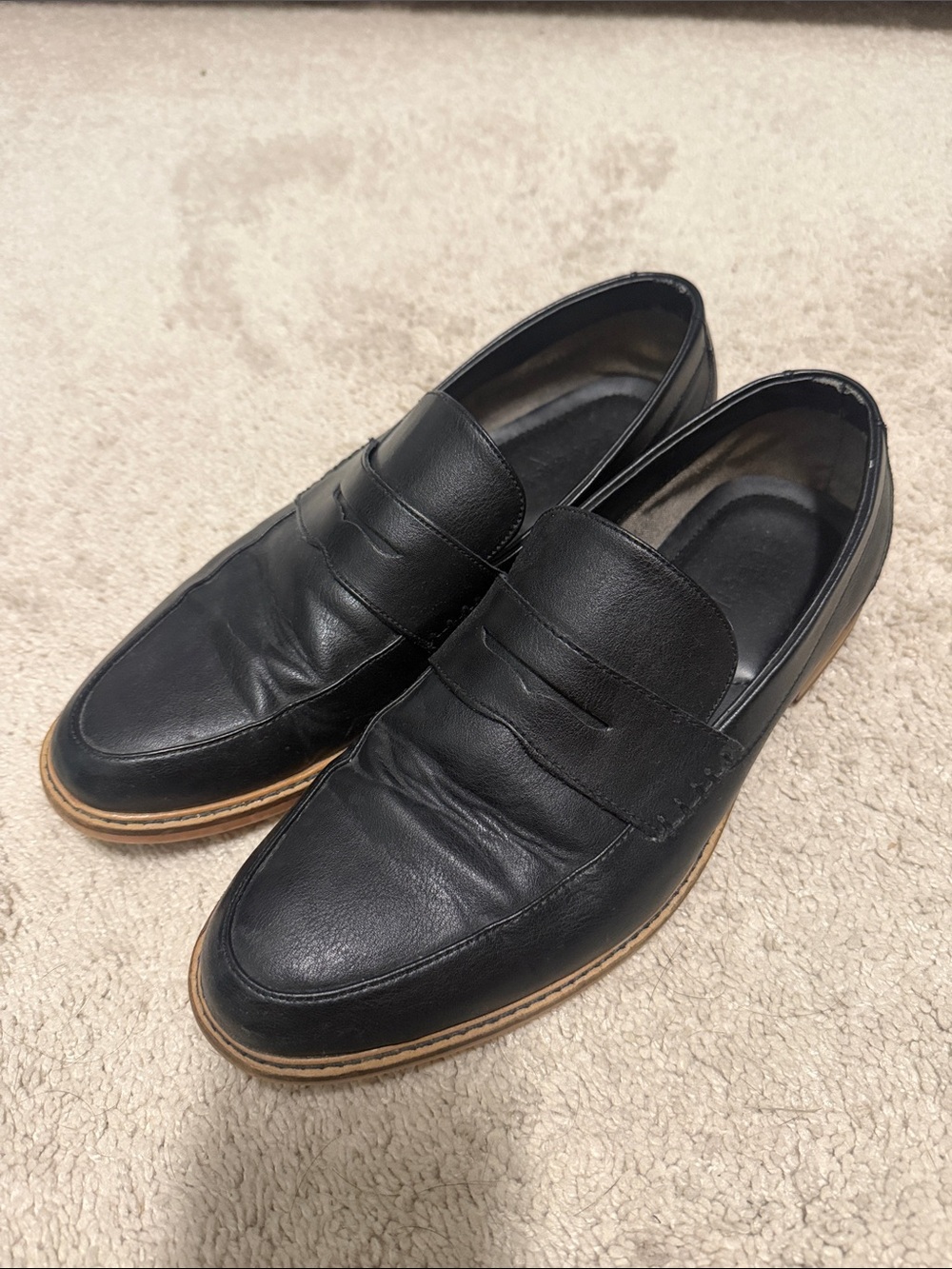Men's Black Leather Penny Loafers with Contrasting Tan Welt